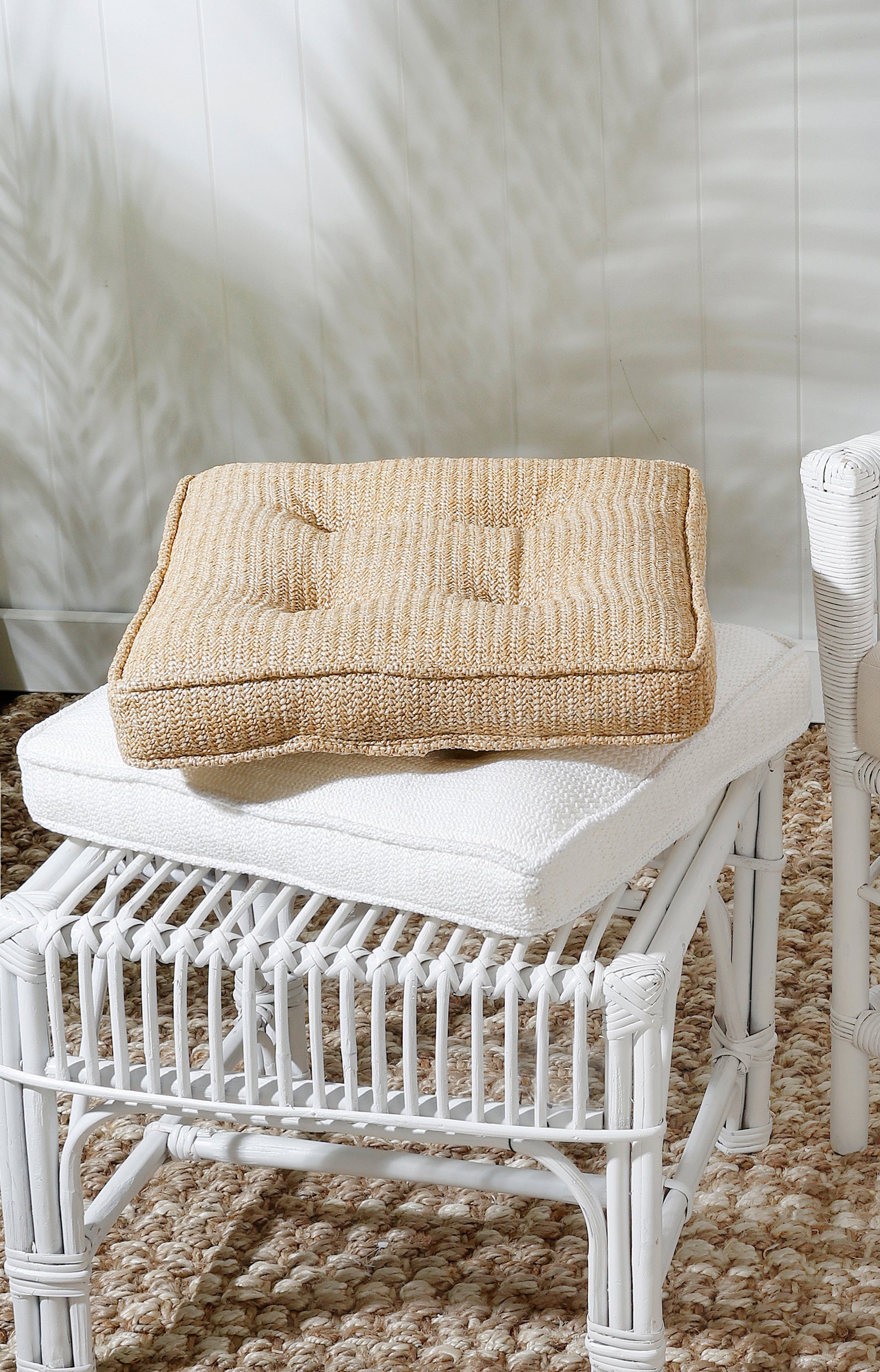 Durable white seat cushion with button accents for outdoor use, 42 x 40 x 5 cm